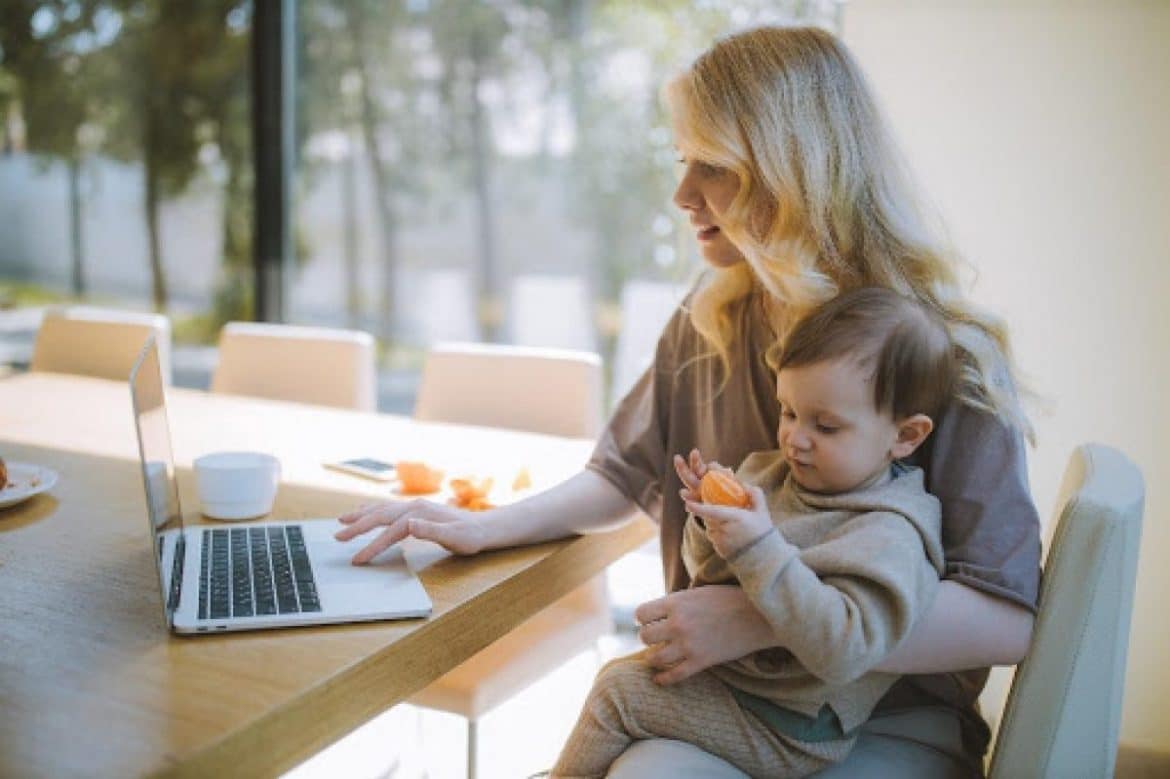 working mother with her baby